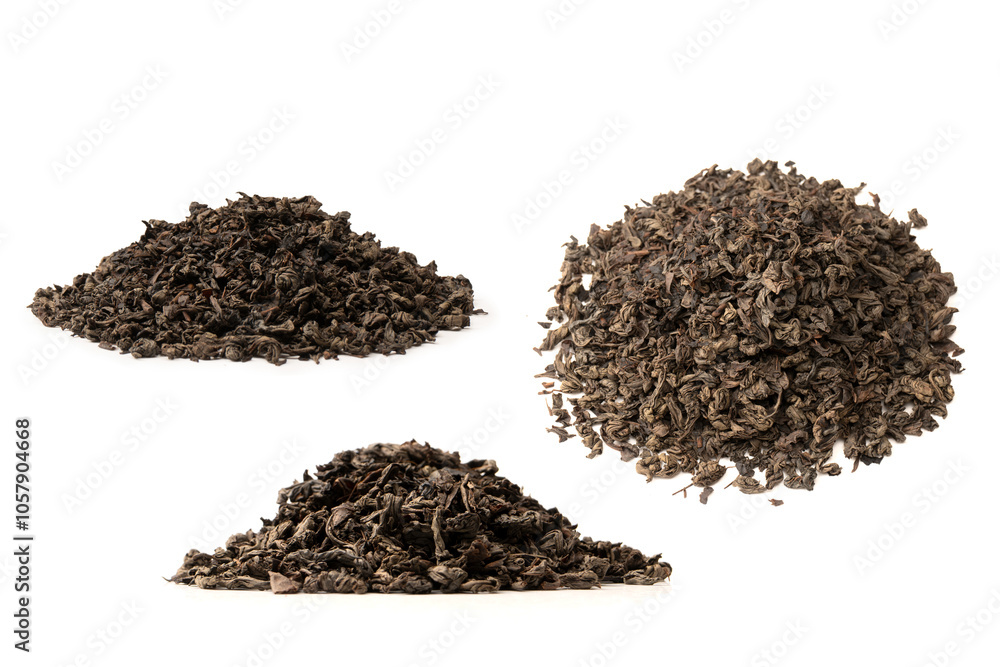 Dried tea leaves isolated on a white background. Dried tea leaves isolated on a white background.