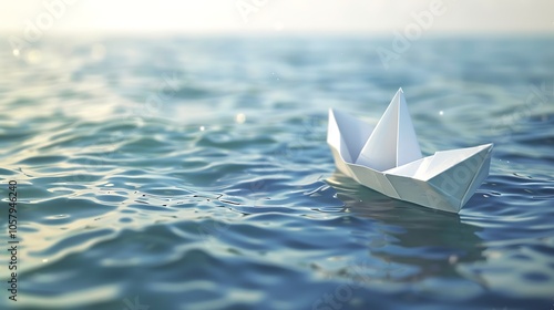 A paper boat floating on a gently rippling body of water. The boat is white and has a simple design, with a single mast and a triangular sail. photo