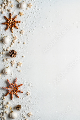 Elegant Christmas background with festive decorations: pine branches, ornaments, shiny stars, and confettiф. Perfect for greeting cards, web banners, and holiday invitations
