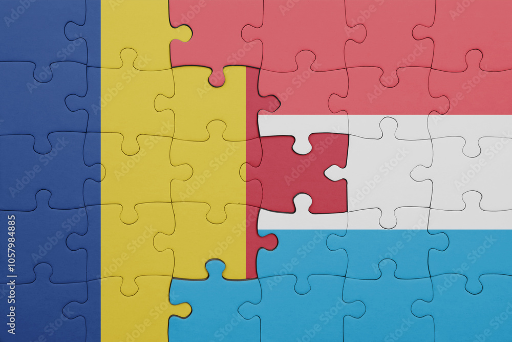 puzzle with the colourful national flag of romania and flag of luxembourg . puzzle with the colourful national flag of romania and flag of luxembourg .