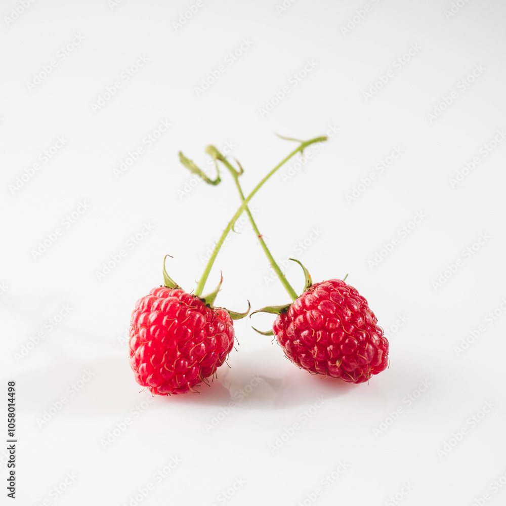 Fresh Raspberries: Juicy, Ripe Berries for a Healthy Summer Snack on a white background Fresh Raspberries: Juicy, Ripe Berries for a Healthy Summer Snack on a white background