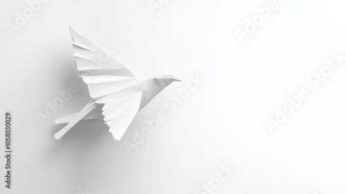 Elegant White Paper Bird in Flight Against a Minimalistic Background