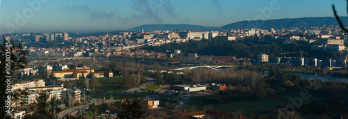 panoramic image showcases an expansive view of Coimbra, Portugal, from an elevated viewpoint