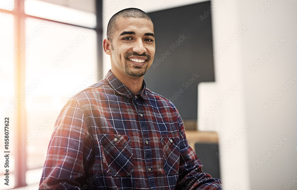 Business, computer and man in office, portrait and connection with confidence, startup and internet. Person, employee or consultant for web design, pc or tech with smile, lens flare or online reading