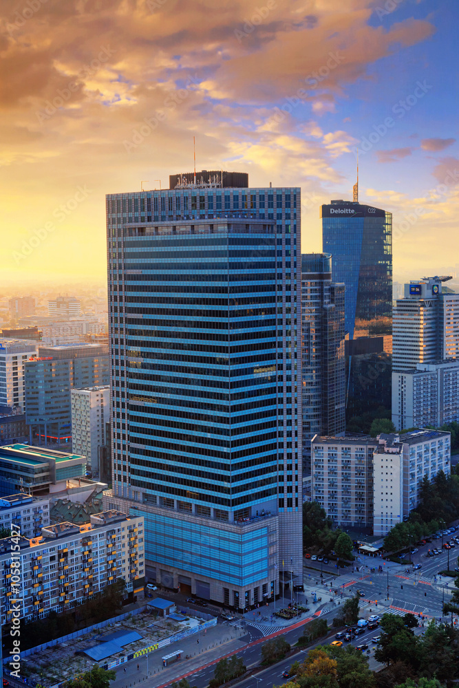 Cityscape at sunset - top view of the Downtown district of Warsaw with high-rise buildings, located within the Wola district in western Warsaw, Poland