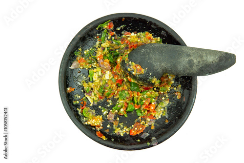 Sambal hot chili sauce is a spicy indonesian traditional food with ingredients red chili, cayenne pepper, onion, garlic, and salt, isolated on white background photo