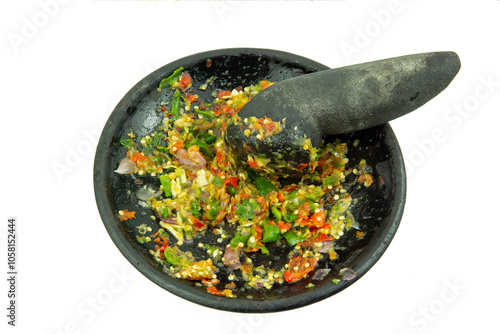 Sambal hot chili sauce is a spicy indonesian traditional food with ingredients red chili, cayenne pepper, onion, garlic, and salt, isolated on white background photo