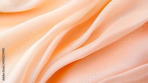 Light peach fabric with elegant soft folds and draping, creating a smooth and luxurious texture.