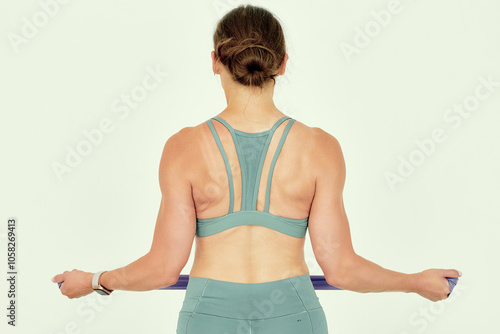 Fitness Trainer Demonstrating Resistance Band Shoulder Pull