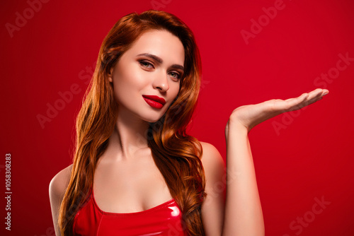 Wallpaper Mural Photo of lovely attractive lady hold empty space dressed sexy leather garment isolated on red color background Torontodigital.ca