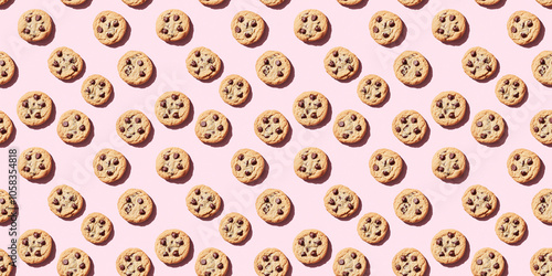 A seamless pattern of chocolate chip cookies, each with its shadow, scattered across the canvas in an elegant display, with soft shadows on a soft pale pink color background