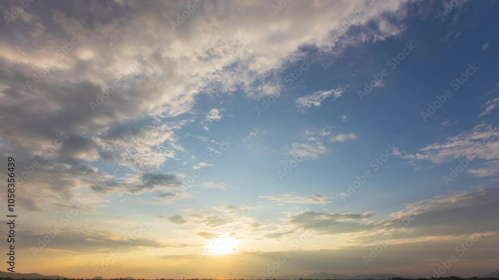 A time-lapse of a serene sunset fading into twilight, with soft clouds drifting across the sky A time-lapse of a serene sunset fading into twilight, with soft clouds drifting across the sky