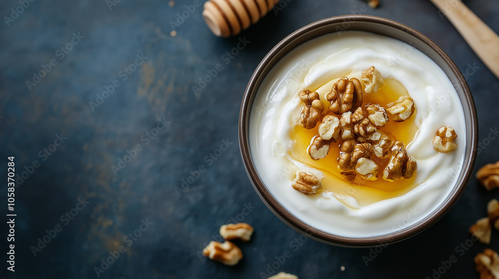 Bowl of Yogurt Topped With Honey and Mixed Nuts, Shot From Above, Emphasizing the Natural Ingredients and Texture Bowl of Yogurt Topped With Honey and Mixed Nuts, Shot From Above, Emphasizing the Natural Ingredients and Texture