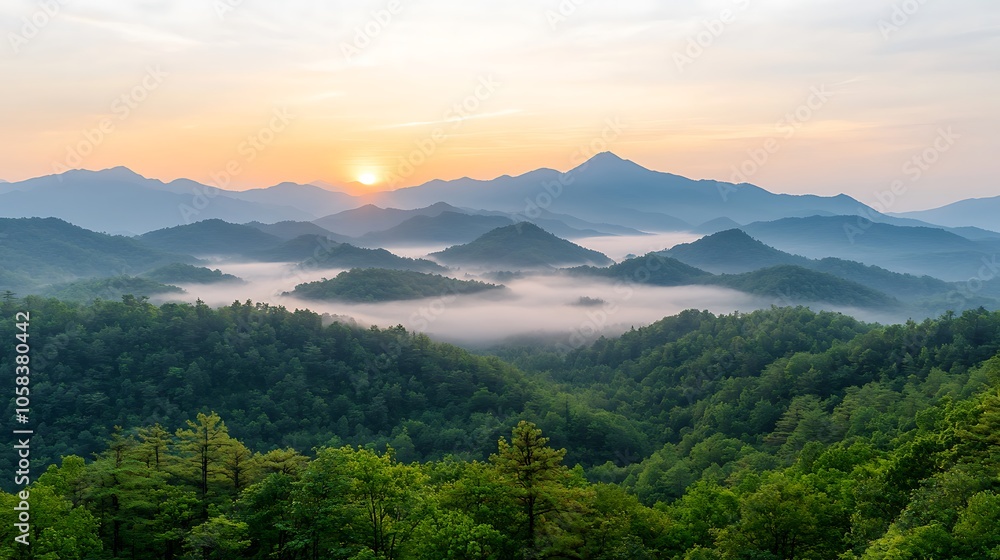 Fototapeta premium Breathtaking sunrise over rolling green mountains with misty valleys at dusk in a serene natural landscape