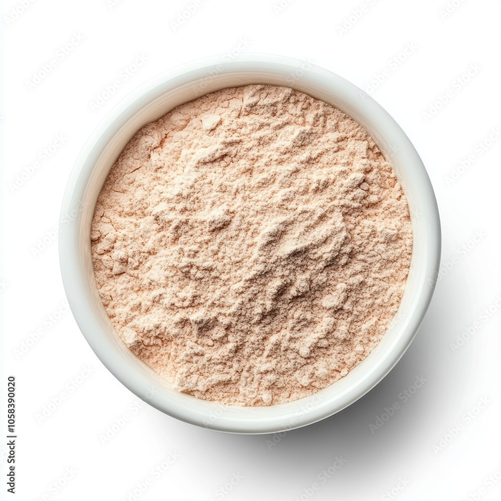 Beige powder in a bowl isolated on a white background Beige powder in a bowl isolated on a white background