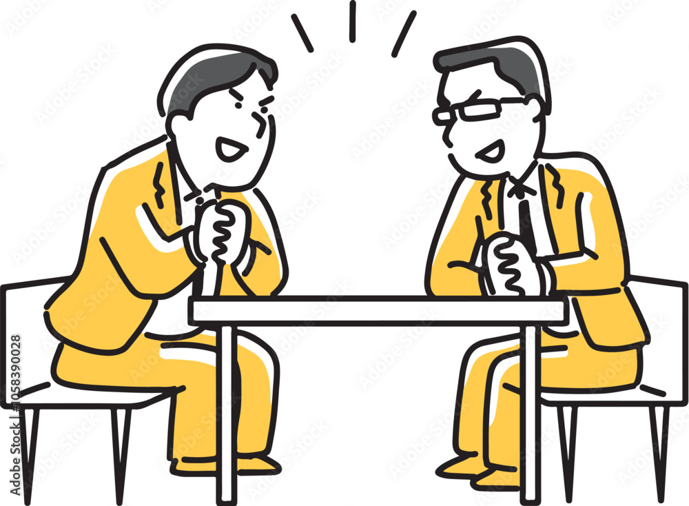机を挟んで話をする男性社員 机を挟んで話をする男性社員