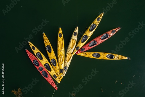 Kayaks moored together in the ocean at Boothbay Harbor, Maine, United States. photo