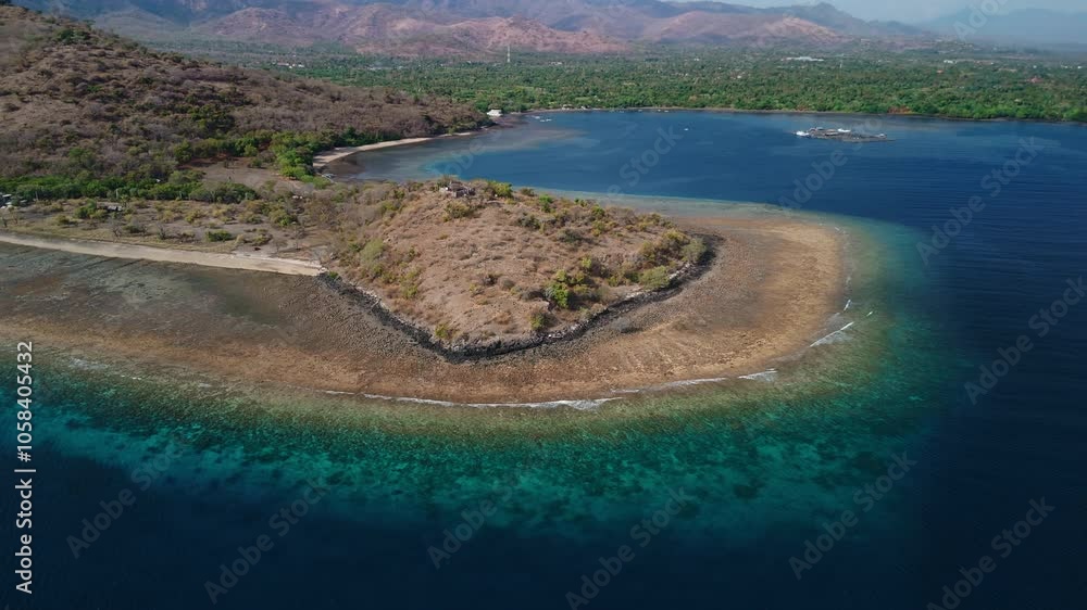 Landscape in West Bali with blue ocean and scenic mountains in Pemuteran, Aerial view Landscape in West Bali with blue ocean and scenic mountains in Pemuteran, Aerial view