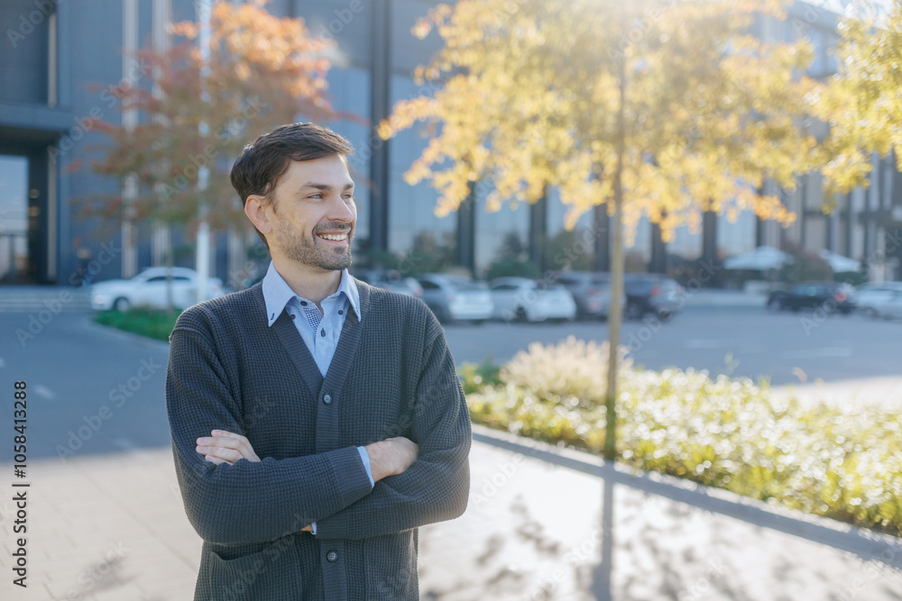 Professional Man with Crossed Arms and Optimistic Expression Professional Man with Crossed Arms and Optimistic Expression