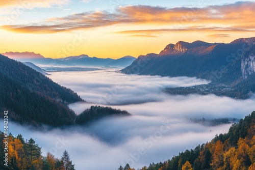 A panoramic view of a beautiful valley covered in a blanket of low-lying clouds, with mountain peaks rising above the mist, creating a mystical and enchanting landscape at dawn.