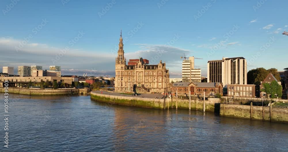 City view of Antwerp, Belgium at sunset. Skyline at the Schelde river. Aerial drone video, golden hour. City view of Antwerp, Belgium at sunset. Skyline at the Schelde river. Aerial drone video, golden hour.