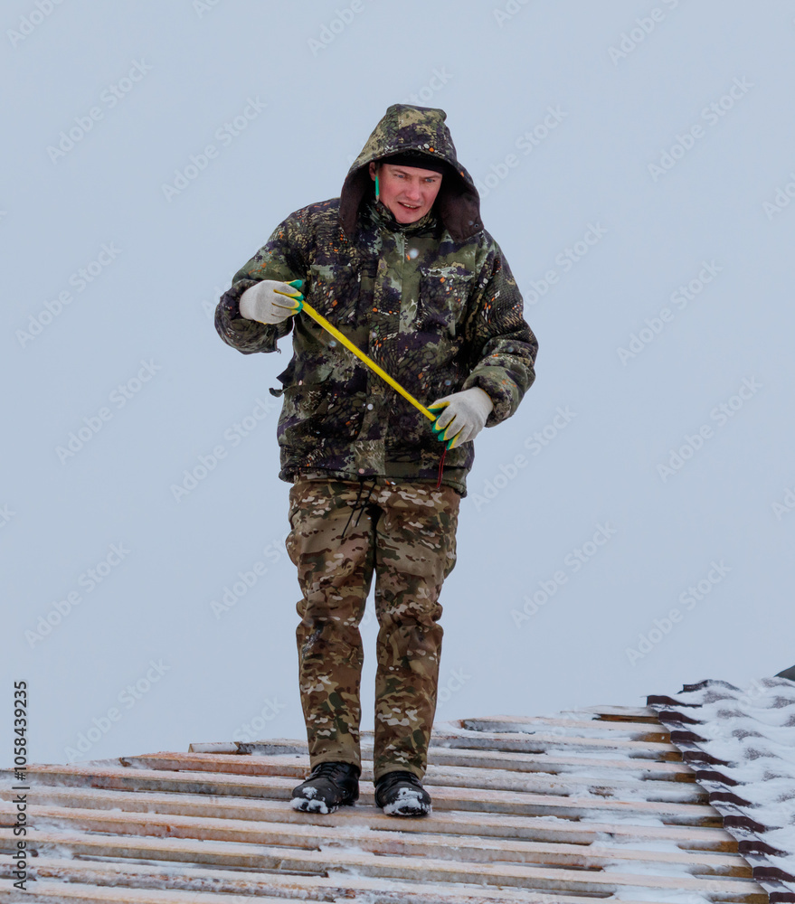 Naklejka premium A man in a green jacket