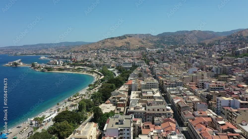 Aerial view of the sea and the embankment in the central part of the city of Reggio Calabria on a summer sunny day, Italy, Europe Aerial view of the sea and the embankment in the central part of the city of Reggio Calabria on a summer sunny day, Italy, Europe