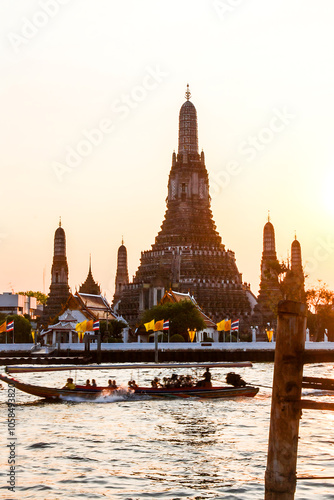 Wat Arun Ratchawararam or Wat Chaeng or Wat Arun is another beautiful landmark located on the banks of the Chao Phraya River. It has a large prang. Thais and foreigners like to visit and pay homage. photo