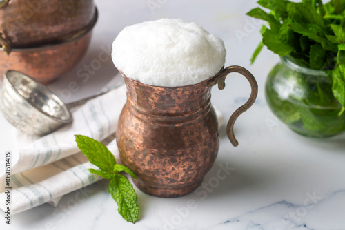 Obraz na płótnie Turkish traditional drink ayran , kefir or buttermilk made from yogurt w salonie