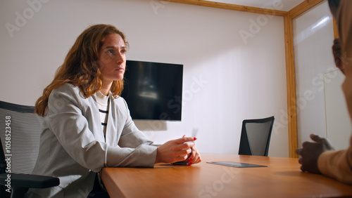 Female boss Listening During Meeting