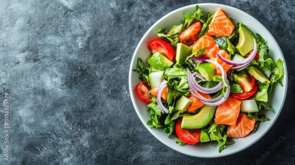 A vibrant salad with salmon, avocado, and onions, ideal for enjoying a healthy meal on a sunny day. This delicious salad offers a refreshing and nutritious option with ample copy space. A vibrant salad with salmon, avocado, and onions, ideal for enjoying a healthy meal on a sunny day. This delicious salad offers a refreshing and nutritious option with ample copy space.