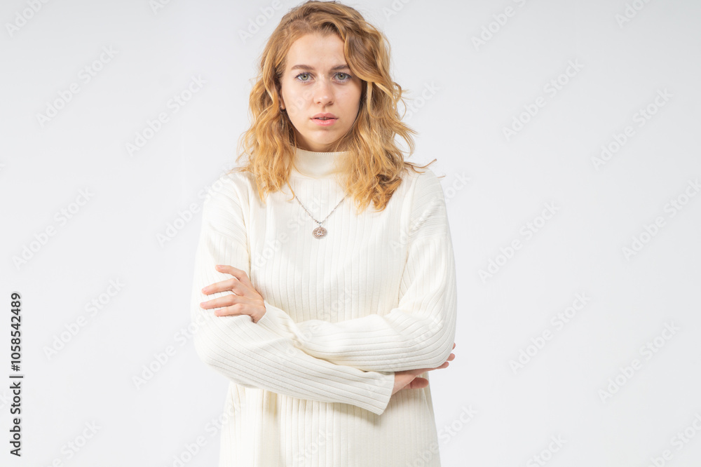 Waist-length portrait of surprised young attractive blonde girl on white background Waist-length portrait of surprised young attractive blonde girl on white background