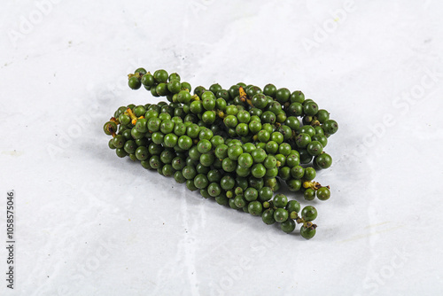 Green pepper corn on the branch photo