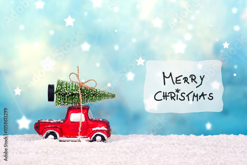 merry Christmas, Christmas tree on toy car. Christmas holiday celebration concept with best wishes for the new year 2025 photo