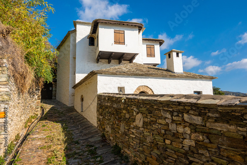 Stone lined narrow pathways in traditional greek village Makrinitsa in Pelion Greece. Traditional architecture. photo