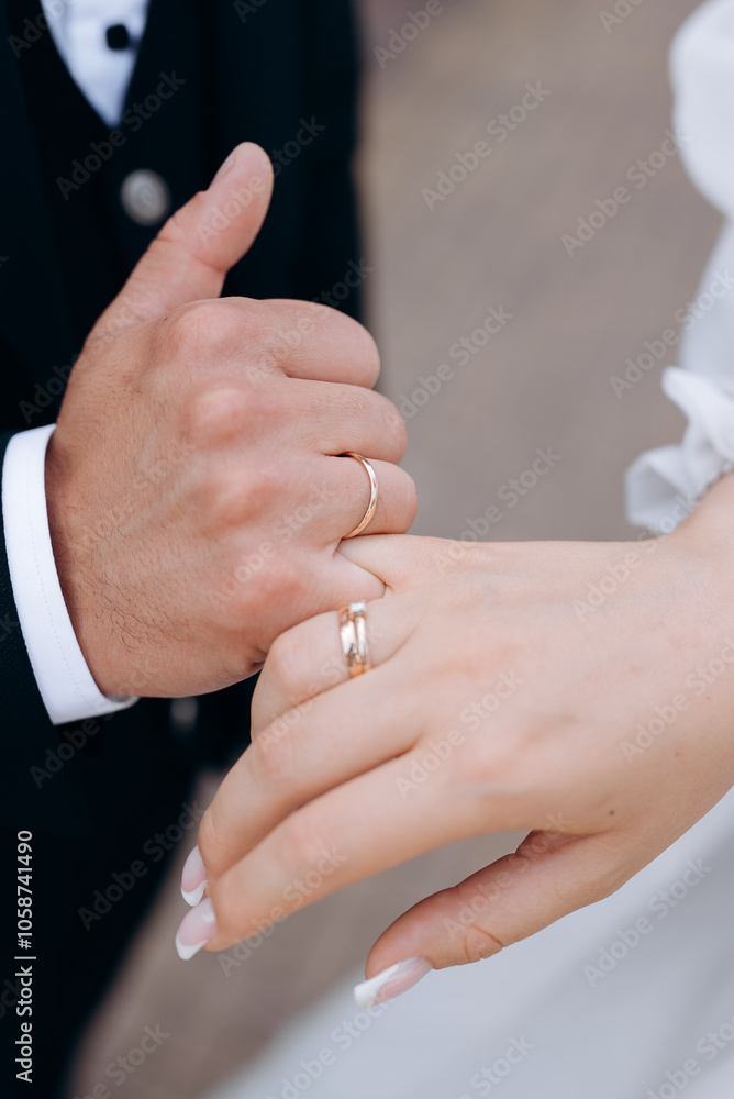 bride and groom holding hands