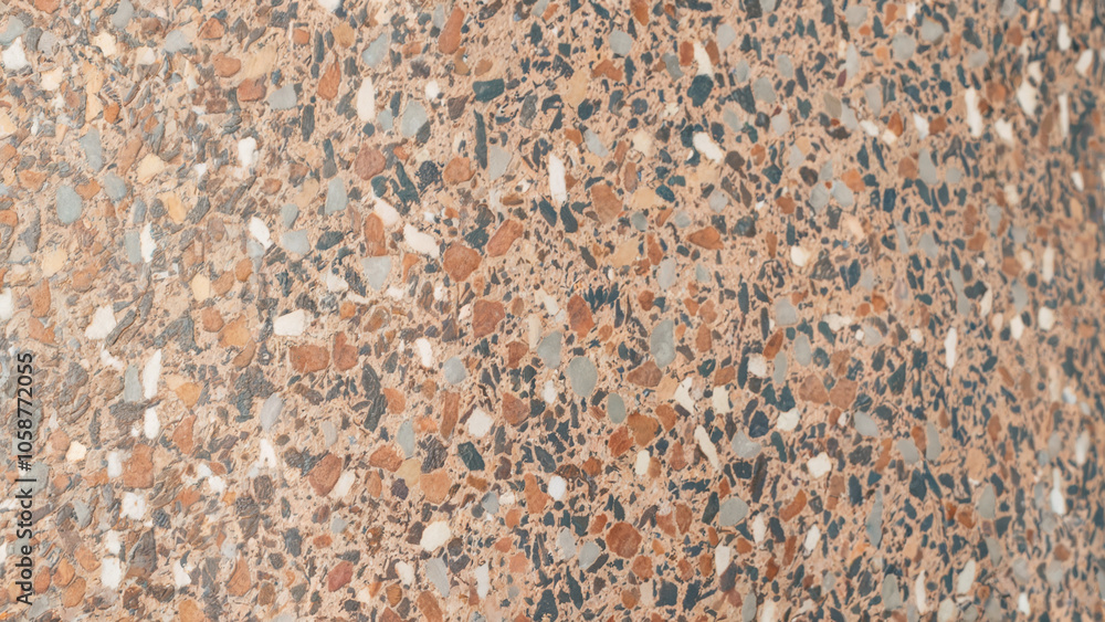 Close-up view of a colorful stones wall, featuring an array of hues that create a lively and dynamic visual effect Close-up view of a colorful stones wall, featuring an array of hues that create a lively and dynamic visual effect