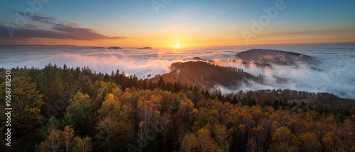 Sunset with a panoramic view over the Murg Valley and the upper Rhine plain during an inversion in the German North Black Forest photo