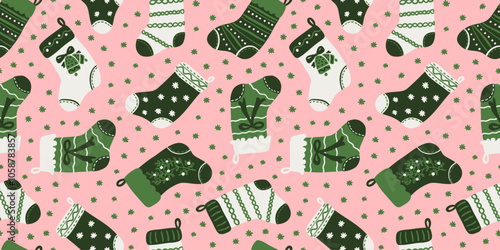 Cute Christmas stockings and snowflakes seamless repeat pattern. Christmas knitted hanging socks with leaves, berries, bells and bows. Holiday season background for wrapping paper, textile design.