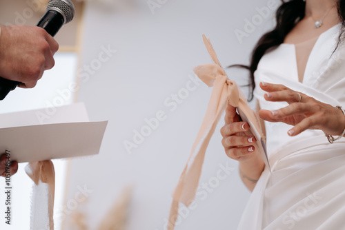 person writing on a clipboard