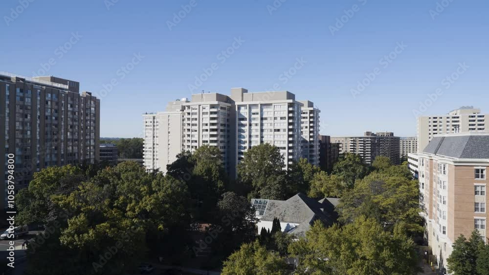 Sunny morning in Bethesda Maryland, no clouds in the sky, buildings lighting up Sunny morning in Bethesda Maryland, no clouds in the sky, buildings lighting up