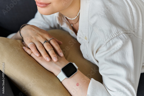 A young woman lying comfortably at home, enjoying a relaxed atmosphere.