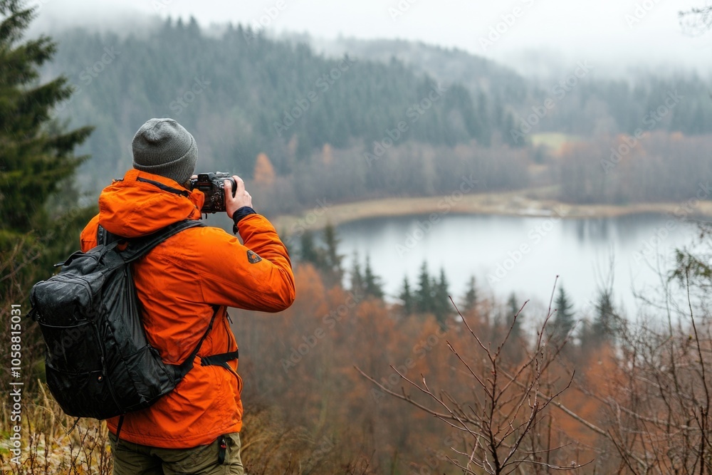 A person capturing memories by the water's edge, perfect for travel or outdoor use A person capturing memories by the water's edge, perfect for travel or outdoor use