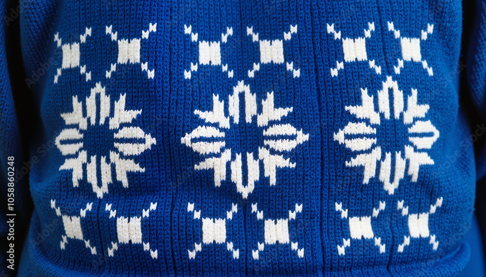 Blue Sweater with White Snowflake Pattern Close-Up Blue Sweater with White Snowflake Pattern Close-Up