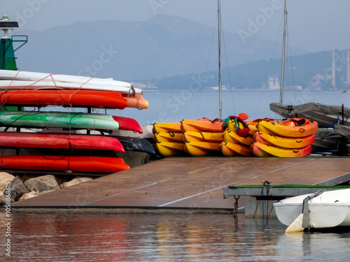 Boats and kayaks in storage on the coast in Bay area. Can Picafort, Majorca, Island in Spain. Kayak Storage Rack, Free Standing Stand Carrier, Heavy Duty Storage Rack System for SUP Canoe Paddle Board