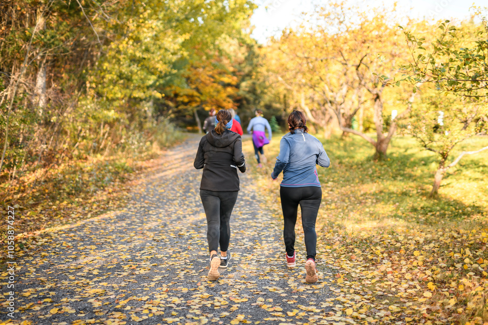 Fototapeta premium group of runners running in autumn Park