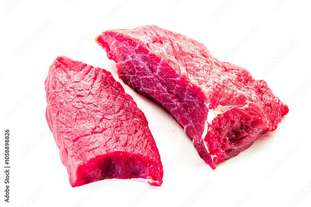 Fototapeta premium Raw beef meat isolated on white background. Food concept