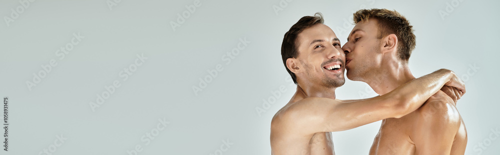 Fototapeta premium Two young men share a loving embrace, showcasing their connection in a heartfelt moment.