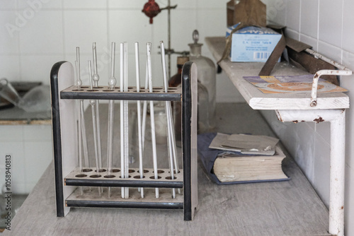 Graduated cylinders and pipettes in an old hospital laboratory