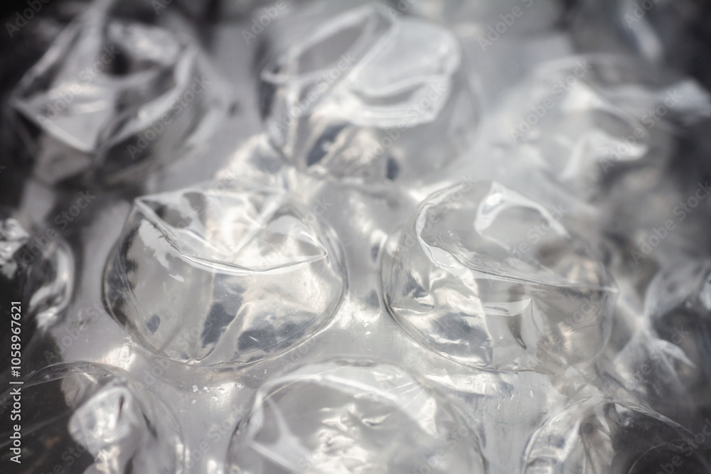 Extreme macro of plastic bubble wrap texture. Selective soft focus, shallow depth of field. Abstract dreamy background Extreme macro of plastic bubble wrap texture. Selective soft focus, shallow depth of field. Abstract dreamy background